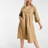 Y.A.S Petite Y.A.S. Petite Wrap Midi Smock Dress In Tan For Women 1 Y.A.S Petite Y.A.S. Petite Wrap Midi Smock Dress In Tan For Women -Women's Y.A.S Sales Shop unnamed file 1210
