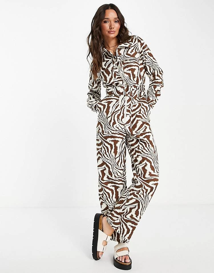 Y.A.S Animal Printed Zip Through Jumpsuit In Brown For Women Zebra Print 6 Y.A.S Animal Printed Zip Through Jumpsuit In Brown For Women Zebra Print - Image 4